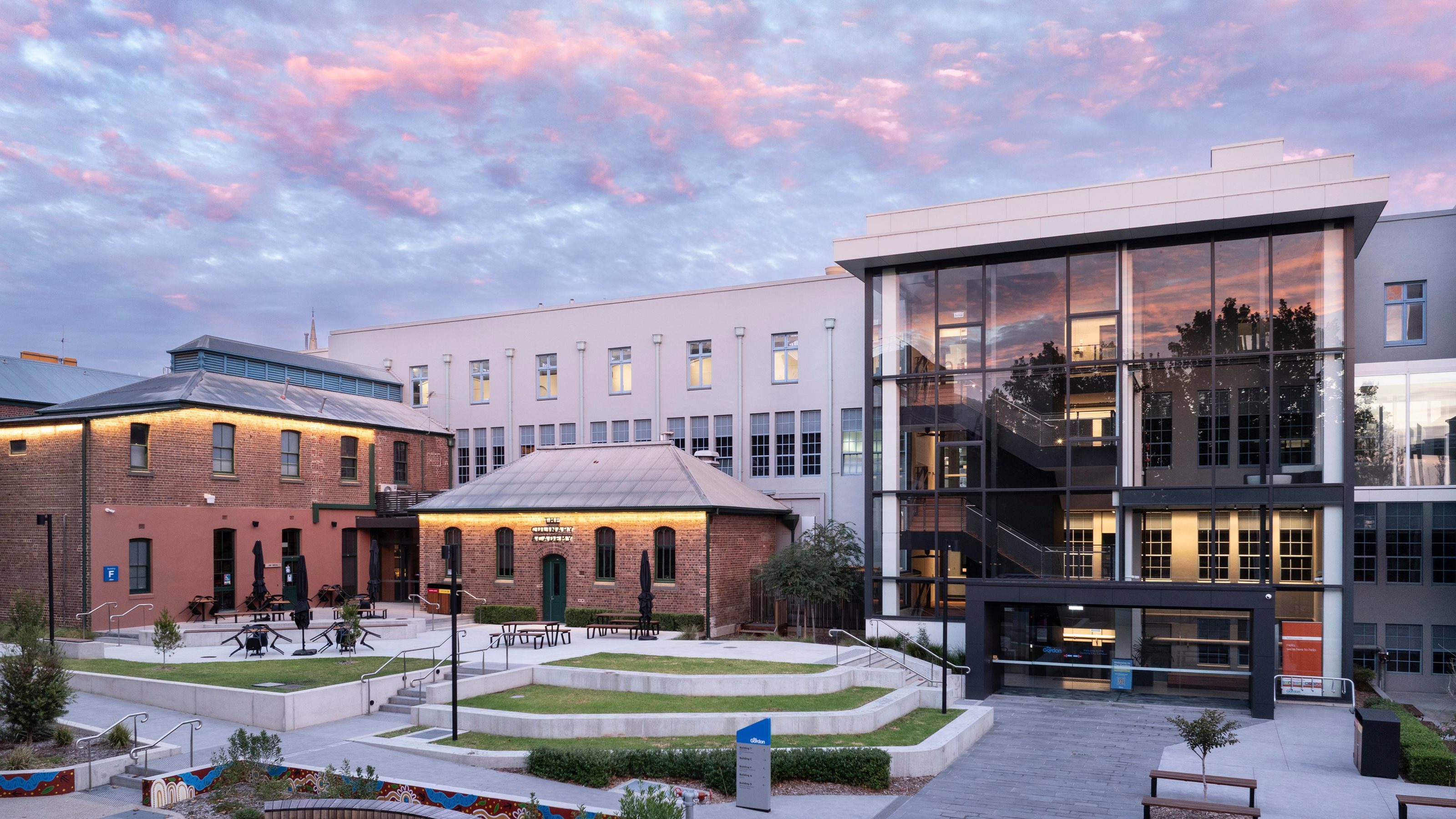Image of the Gordon Fenwick Street Campus courtyard at twilight.