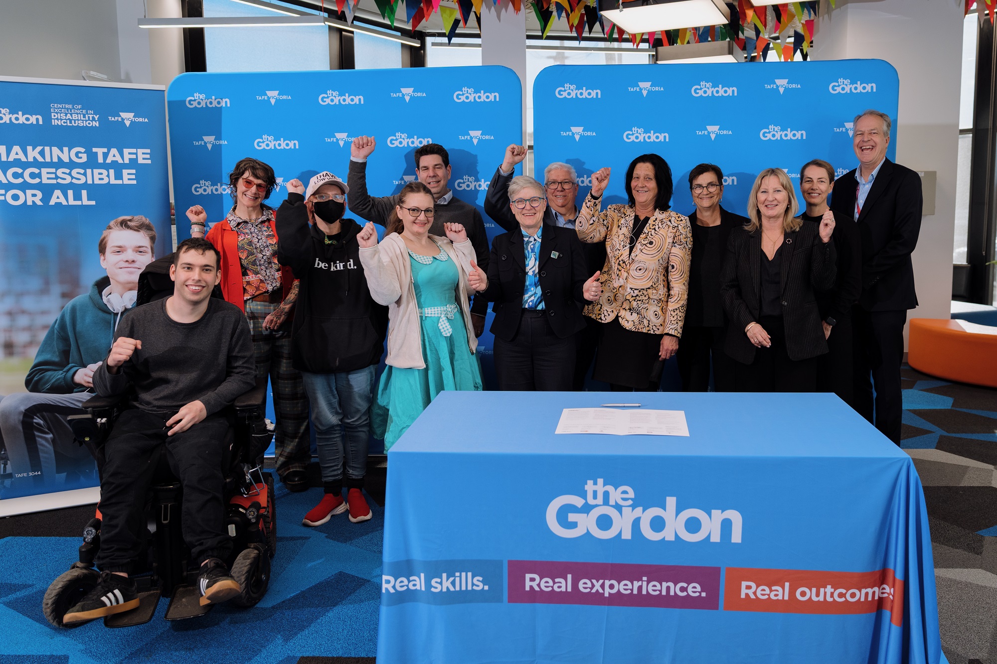 Image of signatories to the compact as well as COE co-creation team members celebrating the Geelong Inclusive Employment Compact