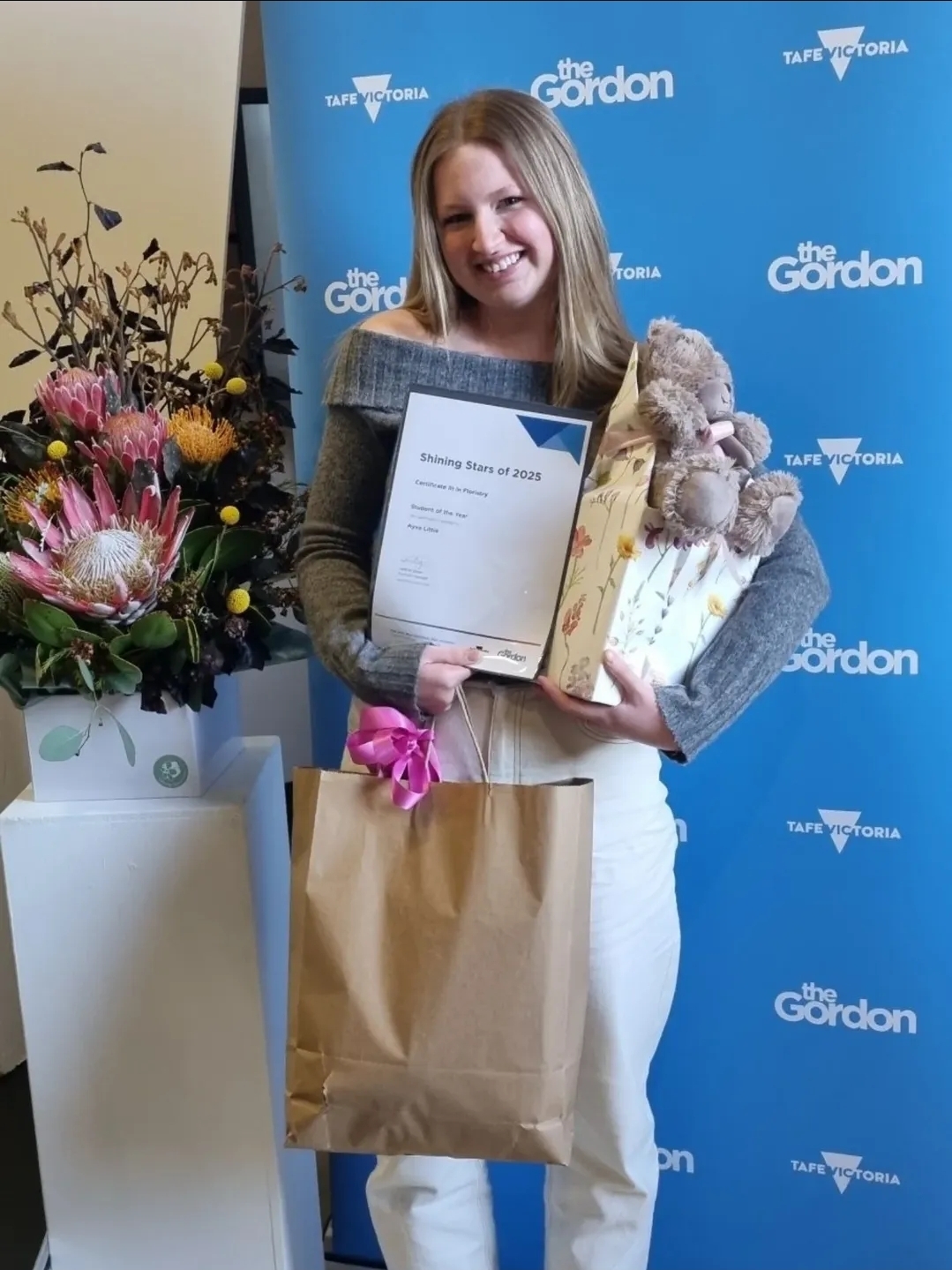 Image of Mark Littles daughter Ayva with her Student of the Year award