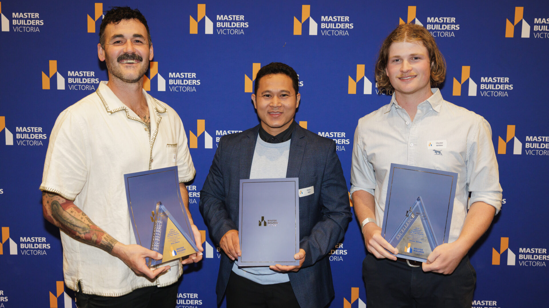 Fourth-year Cabinet Making apprentice, Htoo Sey (middle) with other award winners