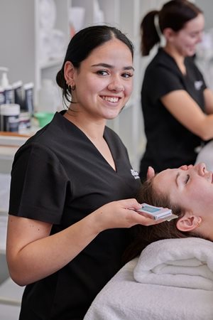 Smiling beauty therapy student